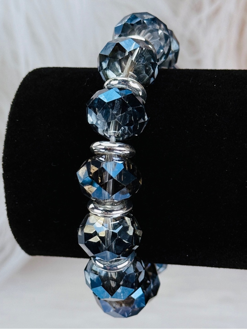 Beautiful silvertone blue reflective Kenneth Cole, New York stretch bracelet